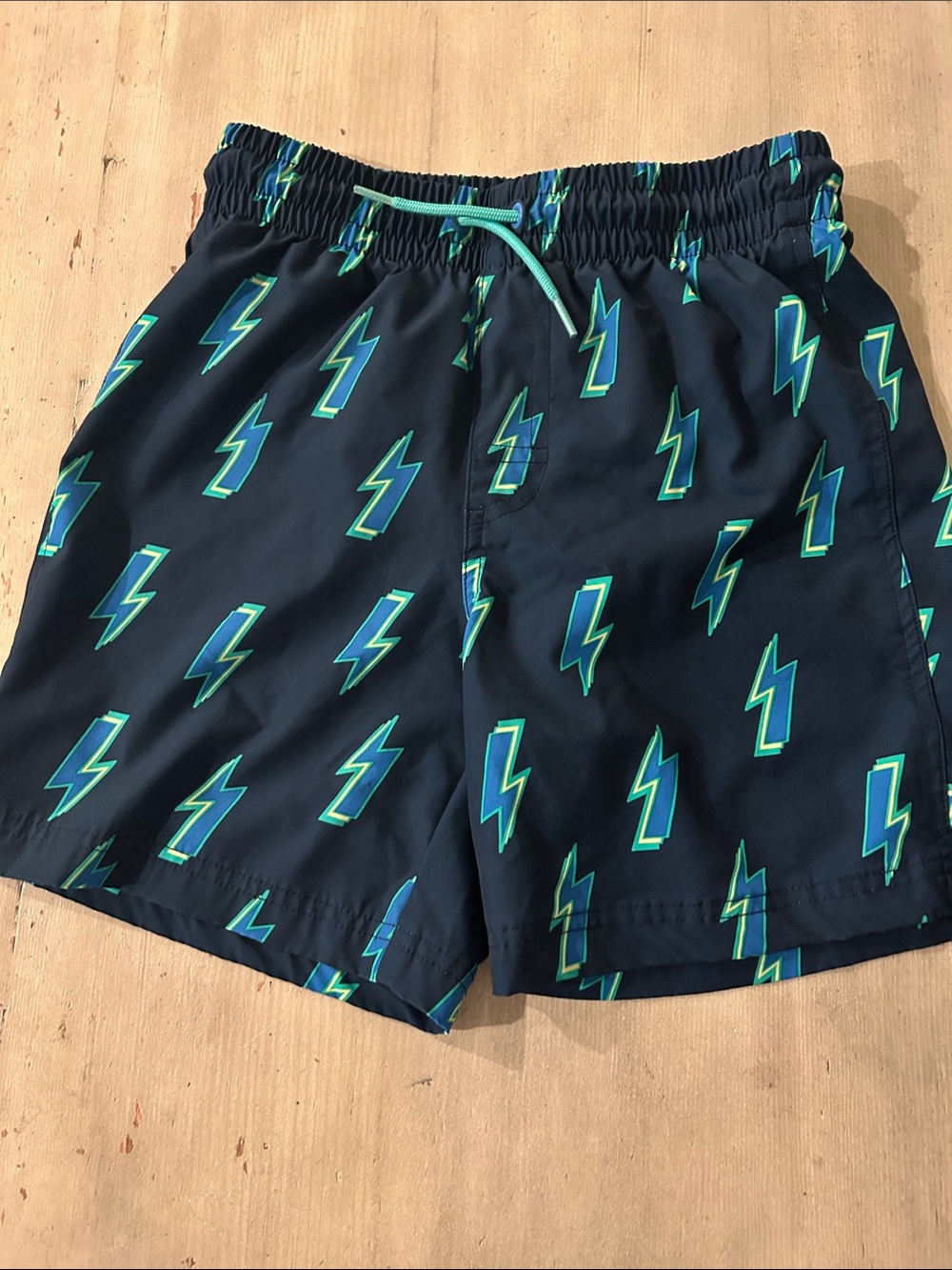 Old Navy. Kids Navy Swim Trunks with Neon Green Lightning Bolts
